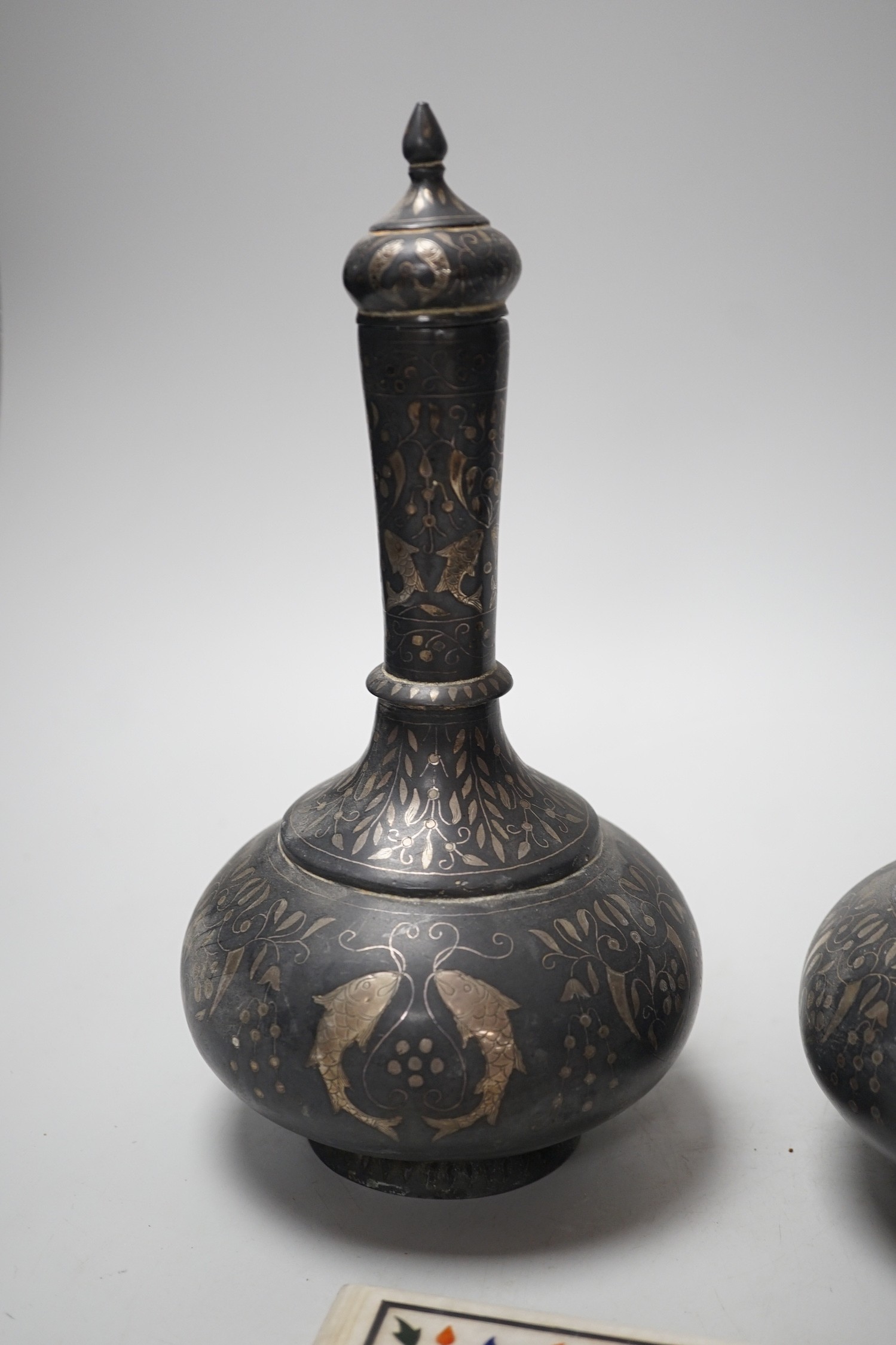 A pair of 19th century Indian Bidri ware water bottles of covers and a Pieter Durer plaque, bottles and covers 25cms high